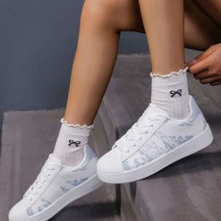 Buty Sportowe damskie 1026-5885-BL561 (12par∕36-41) biały